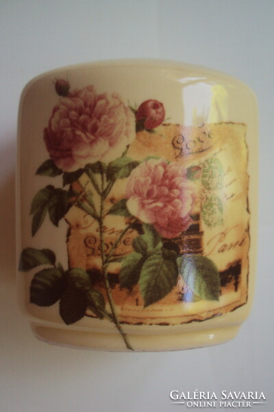 Vintage, butter-colored porcelain salt shaker with rich rose pattern.