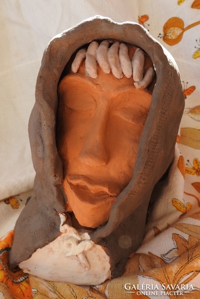 Lady's head - terracotta bristle statue