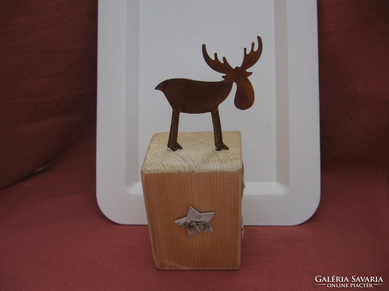 Christmas decoration with metal deer on wooden base