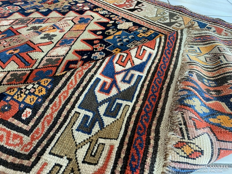 Antique Caucasian Cossack rug 280x130