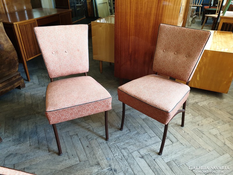 Old retro upholstered chair with metal frame tubular frame