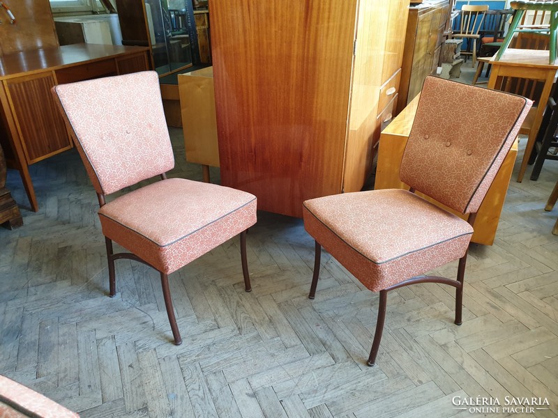 Old retro upholstered chair with metal frame tubular frame