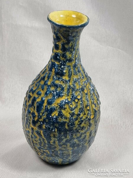 Painted-glazed ceramic vase, with cracked glaze, with the label of a craftsman company, xx.Second half