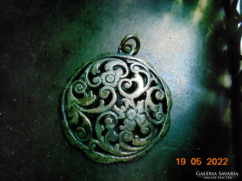 Antique pierced silver plated pendant