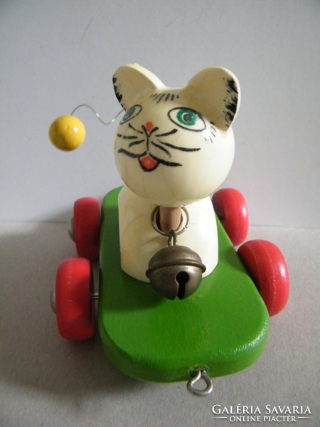 Vintage rolling cat toy made of wood