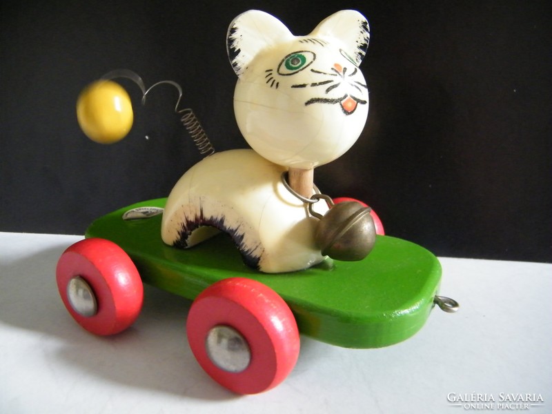 Vintage rolling cat toy made of wood