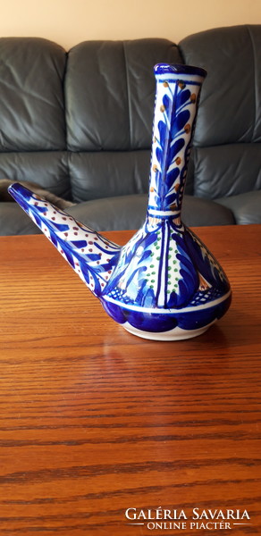 Old Andalusian porcelain wine jug with blue pattern