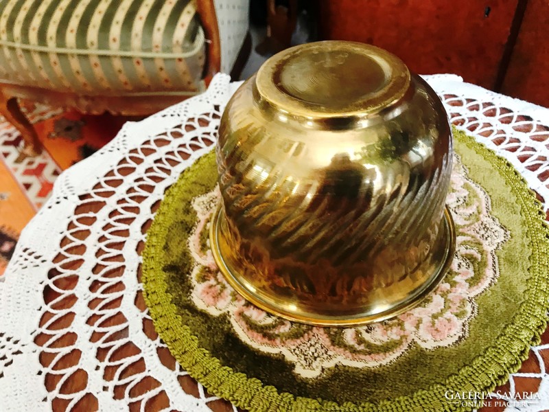 Old brass pot with a special shape and a smaller size