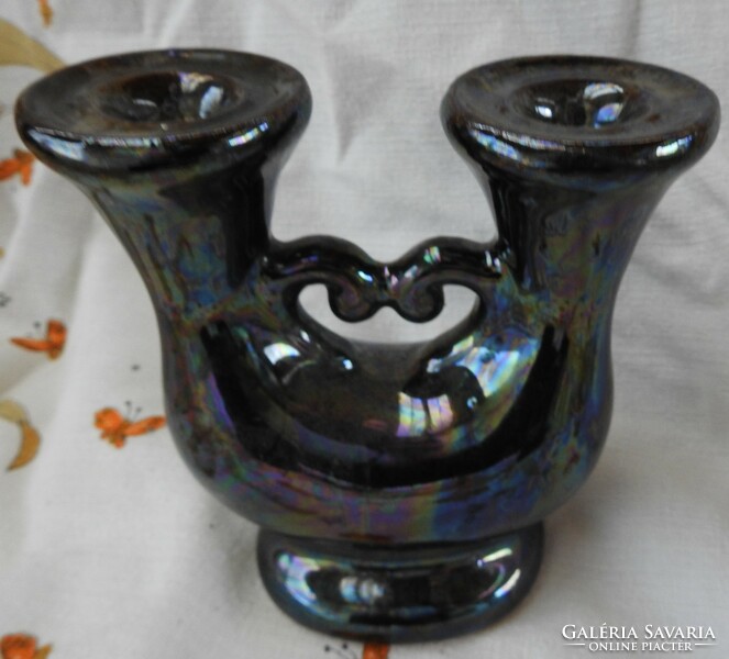 Eosin glazed two-pronged ceramic candlestick with heart decor in the middle