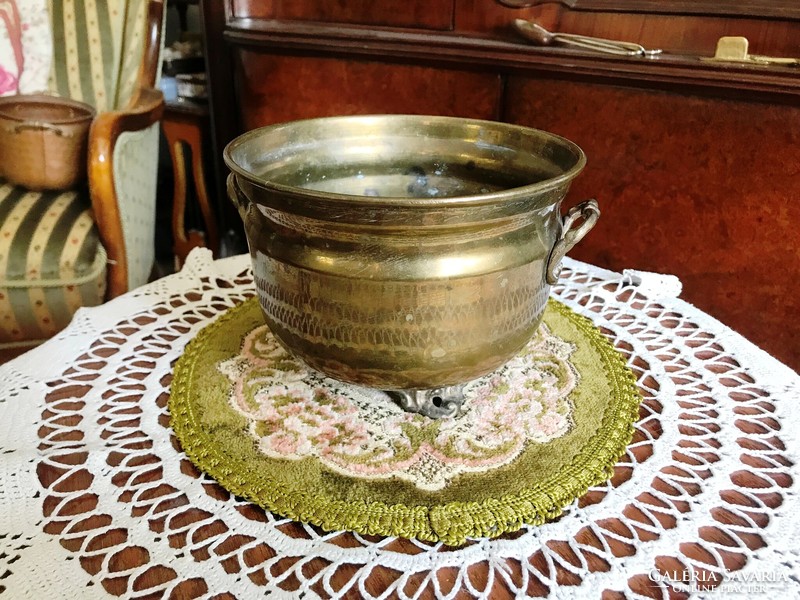 Specially shaped, medium-sized, old, three-legged, brass pot