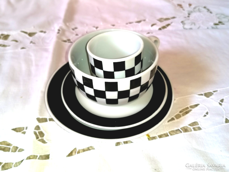 Couple with modern checkered cup of tea and coffee