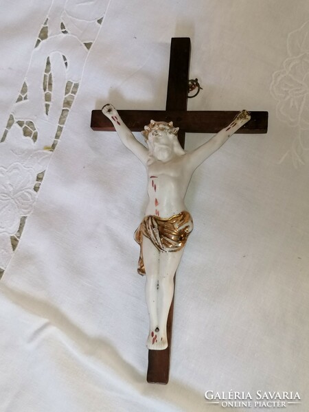 Old corpus with cross, porcelain Jesus body