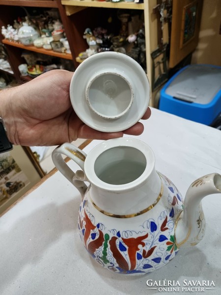 Old porcelain spout