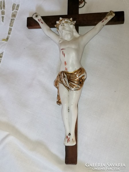 Old corpus with cross, porcelain Jesus body