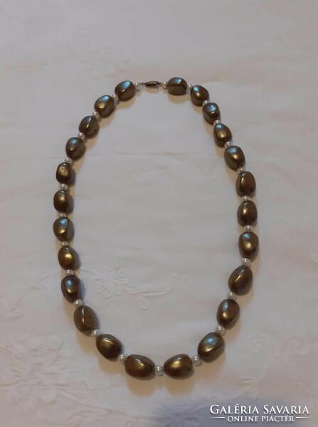 Beautiful old gold tekla necklace with big eyes