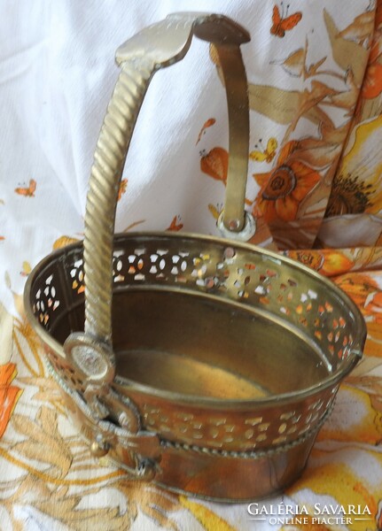 Old basket with copper handles