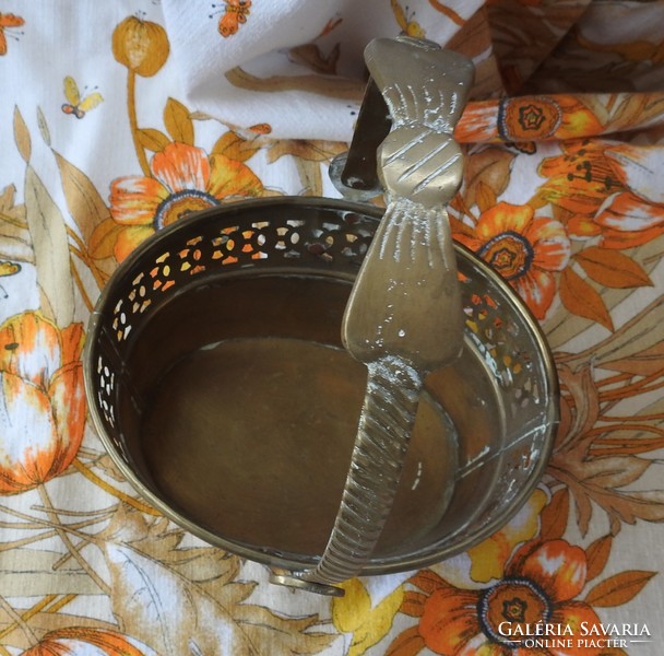 Old basket with copper handles