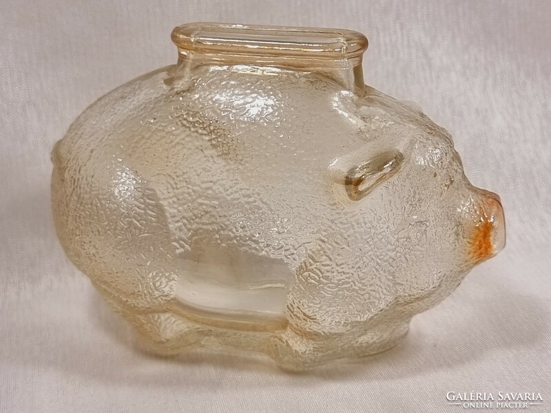 Piggy bank with iridescent glass and piggy money box from the 1950s.