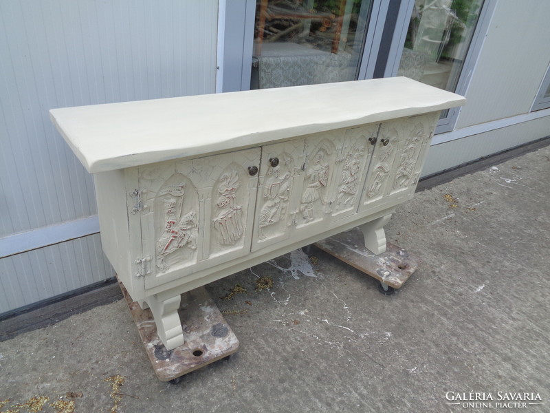 Chest of drawers with carved doors