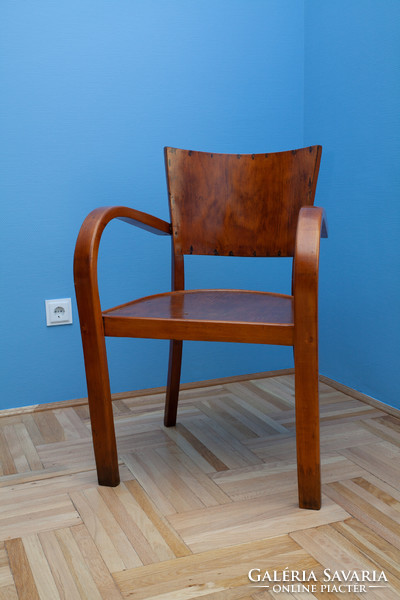 Art deco chair with armrests