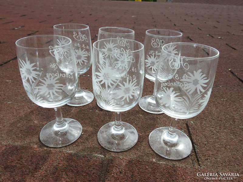 Set of old, hand-polished snowflake patterned monogrammed and vintage wine glasses