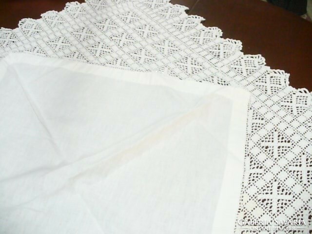 White tablecloth with nice crochet wind