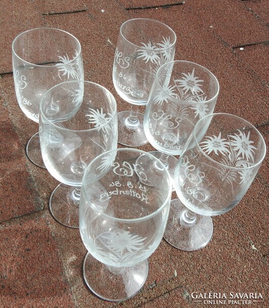 Set of old, hand-polished snowflake patterned monogrammed and vintage wine glasses