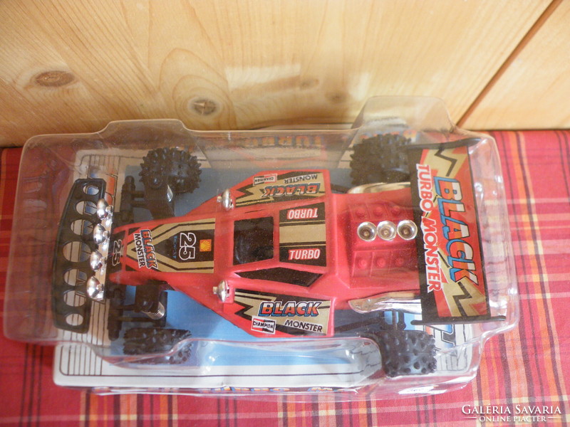 Old retro black turbo monster tow truck from the 1980s in original, unopened packaging