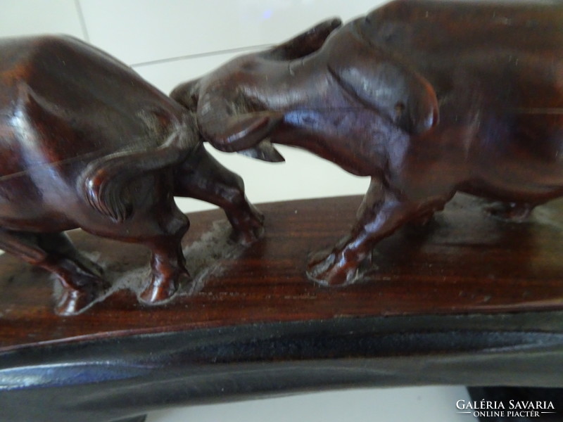 Water buffaloes at work, very nice flawless wood carving