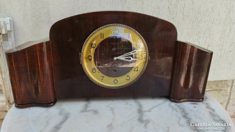 Table clock with bim-bam quarter percussion structure. Melody playing the melody indicated.