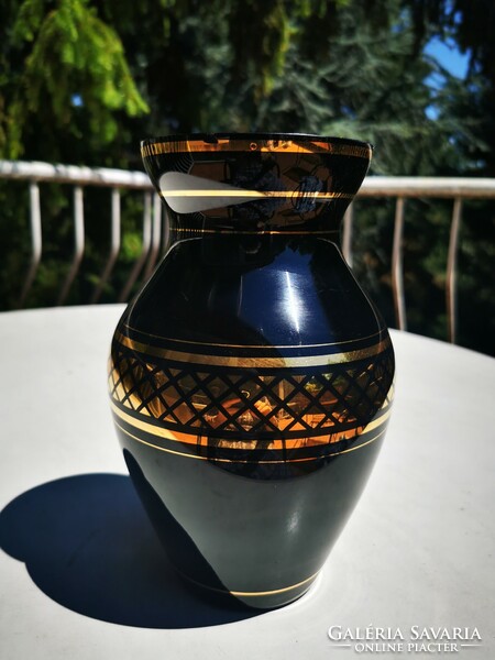 Old gilded hyalith vase
