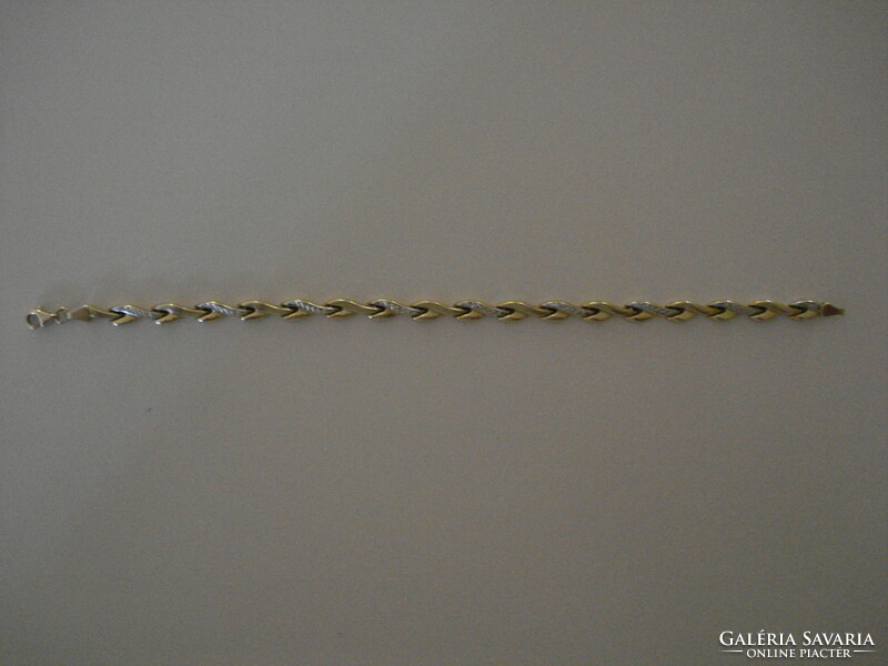 New 14k yellow and white gold bracelet with engraved pattern for sale.