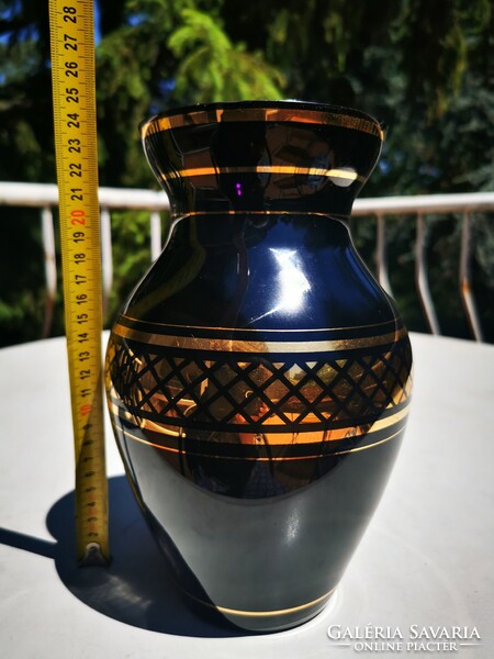 Old gilded hyalith vase