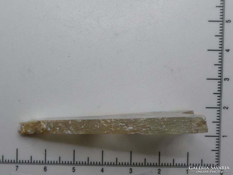 A piece of natural gypsum mineral with twin crystals in the shape of an arrowhead. Collection copy. 9 Grams