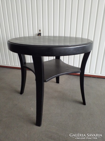 Art deco black round table