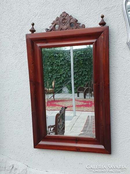 Beautiful old wall wooden mirror with polished glass