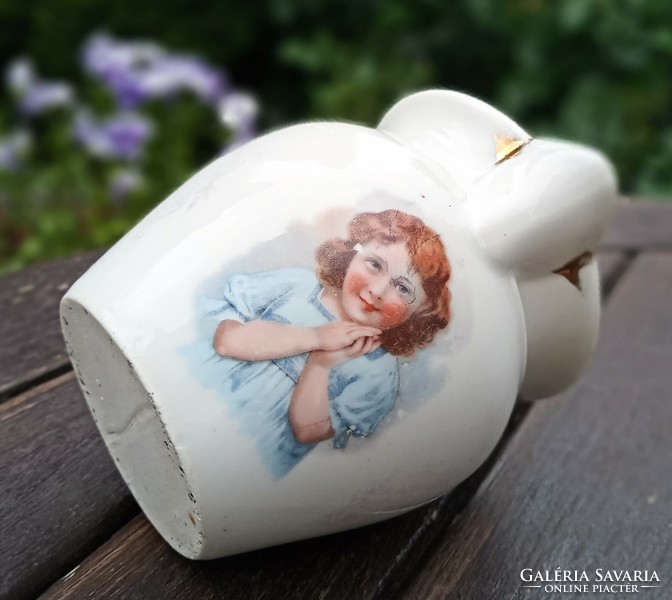 Antique little girl with patterned jar 10cm
