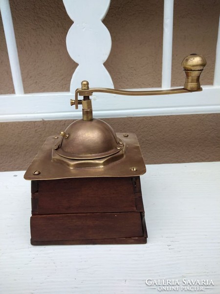 Old medium coffee grinder. Made of wood and copper. --- 2 ---