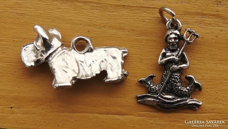 Silver hanging dog and god of the sea