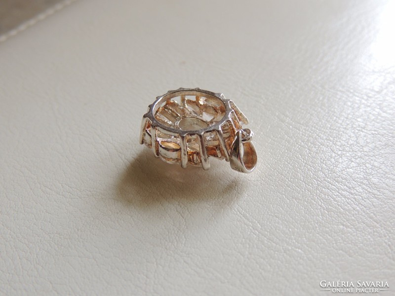 Wonderful silver pendant with many zirconia stones