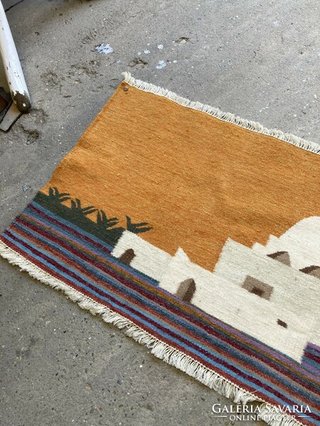 Oriental-style hand-knotted wall mat.