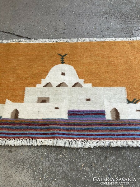 Oriental-style hand-knotted wall mat.