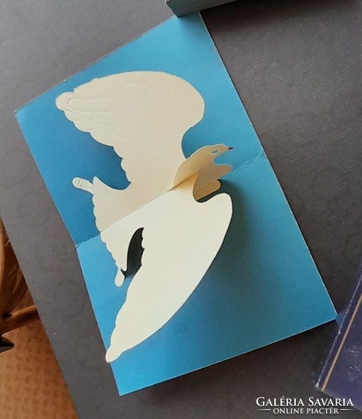 Multilingual greeting card with a dove of peace