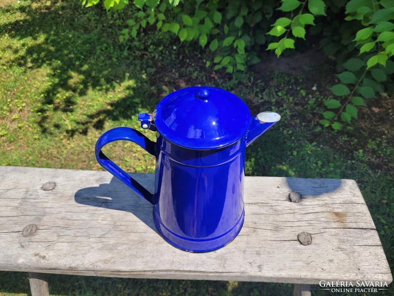 Old vintage blue enameled large teapot with enameled spout