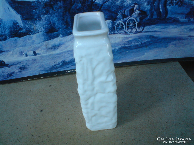 Old retro white ceramic craft vase