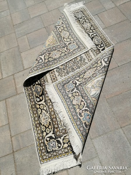 Kashmir hand-knotted silk rug in good condition. Negotiable!