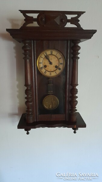 Antique wall clock in junghans