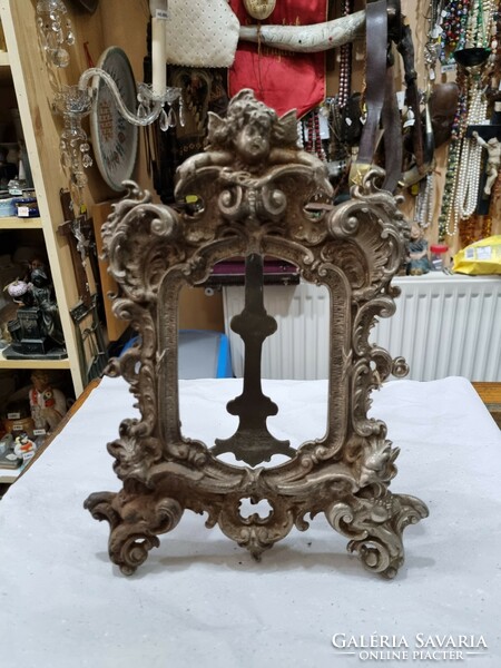 Old cast iron picture holder