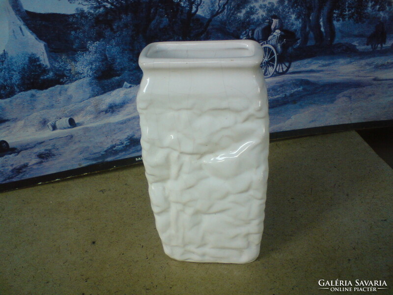 Old retro white ceramic craft vase