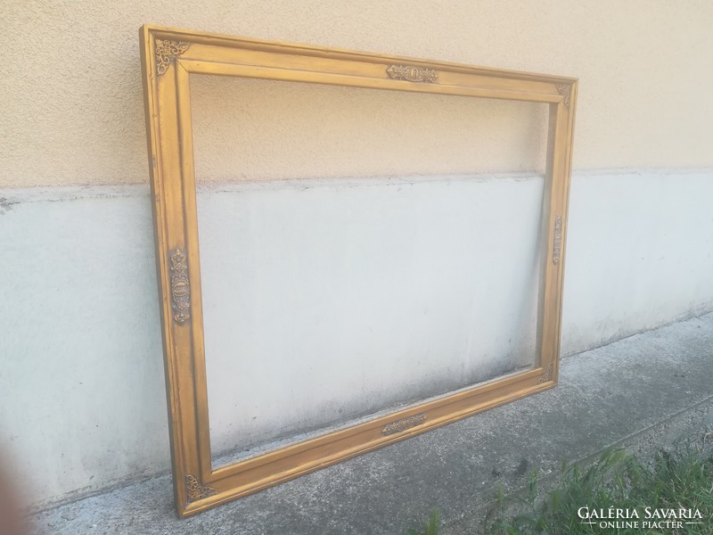 Beautiful elegant wooden picture frame. Nest: 80x60 - 60.5cm. Color: gold, antique.
